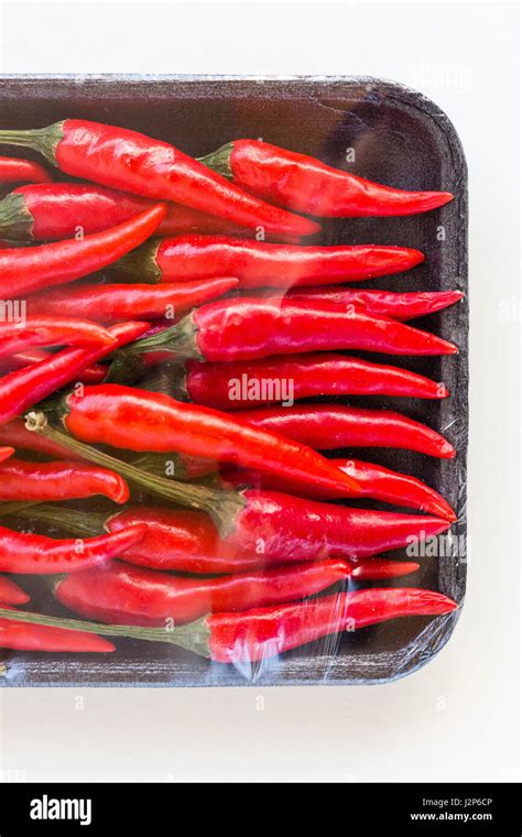 Red Hot Chili Peppers Popular Spices Concept Close Up On Store Packing Of Weighted Red Spicy