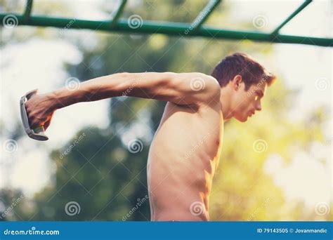 Well Built Muscular Man Doing A Physical Exercise Stock Image Image