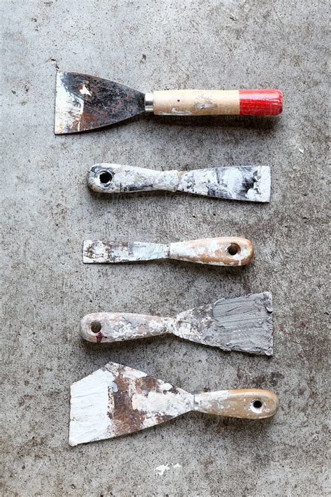 Old And Dirty Putty Knives By Stocksy Contributor Marcel Stocksy