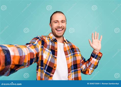 Portrait Of Positive Optimistic Guy With Long Hairdo Wear Flannel Shirt