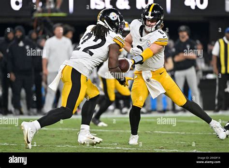 Pittsburgh Steelers Quarterback Kenny Pickett Right Hands Off To