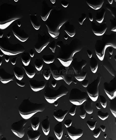 Water Droplets on a Black Background Stock Photo - Image of macro ...