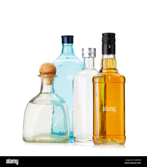 Various Hard Liquor Bottles Gin Vodka Tequila And Whiskey Isolated