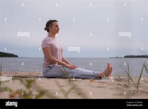 Young Sporty Woman Practicing Yoga Doing Dandasana Pose Stock Photo