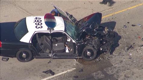 2 Officers Injured After La School Police Car Collides With Dump