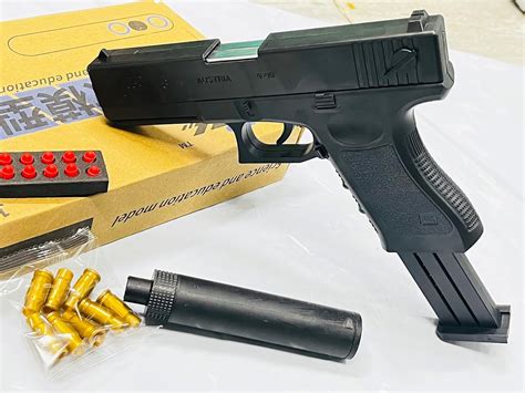 Home Buy Toy Gun With Soft Bullets Toy Pistol With Jump Ejecting Mag