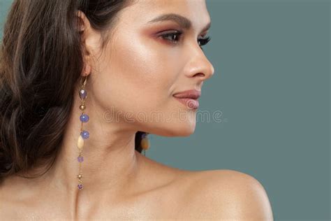 Elegant Stylish Brunette Woman Jewelry Model With Long Curly Hair