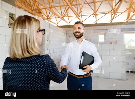 Architect and civil engineer at the construction site Stock Photo - Alamy