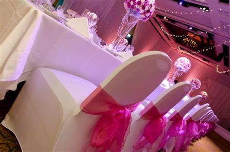 Pink Organza Sashes On White Chair Covers