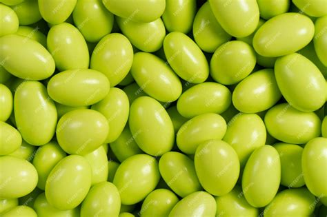 Premium Photo Chocolate Dragee In The Form Of A Pile Green Dragee