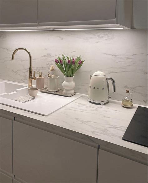 White Kitchen With A White Smeg Kettle And Tulips Dream House Interior