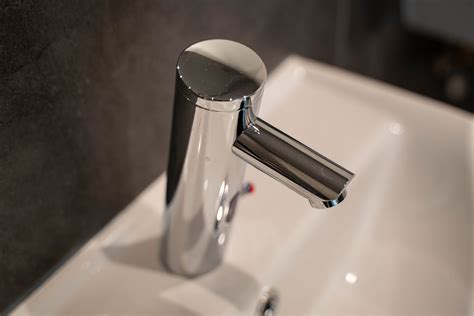 Stainless Steel Faucet on White Ceramic Sink · Free Stock Photo