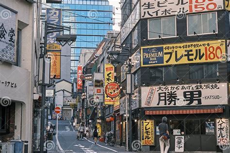 Japanese Street With Shops And Street Sign Boards In Tokyo Editorial