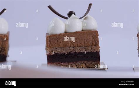 A Chocolate Cakes On White Plate With Whipping Cream Dessert Chocolate