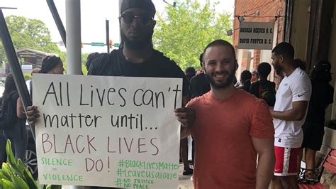 Peaceful Protesters Confront Controversial Local Shop Owner