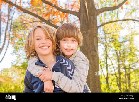 Two Brothers Hugging Hi Res Stock Photography And Images Alamy