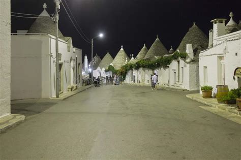 Night View of a Traditional Narrow Street in Alberobello, with Its ...