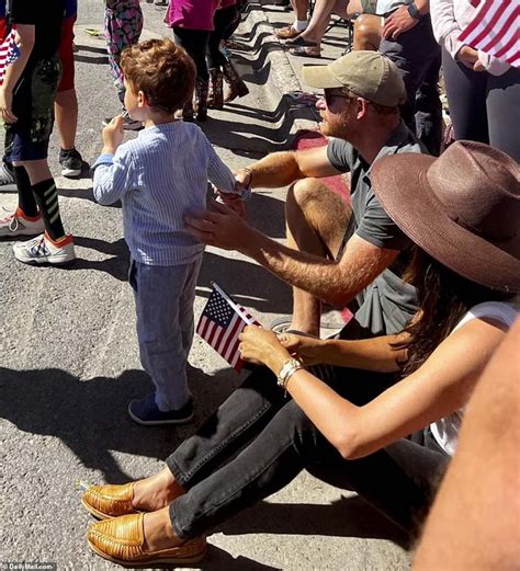 Harry And Meghan Are Seen Attending Th Of July Parade With Archie In