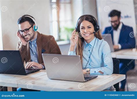 Portrait Of Happy Smiling Female Customer Support Phone Operator Stock