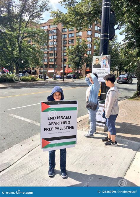 A Child Holding a Poster Asking To Free Palestine Editorial Photo