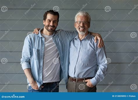 Portrait Of Happy Old Father And Adult Son Hugging Stock Image Image