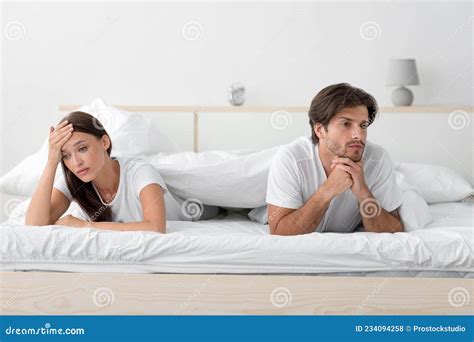 Unhappy Upset Offended Angry Millennial European Wife And Husband Lying