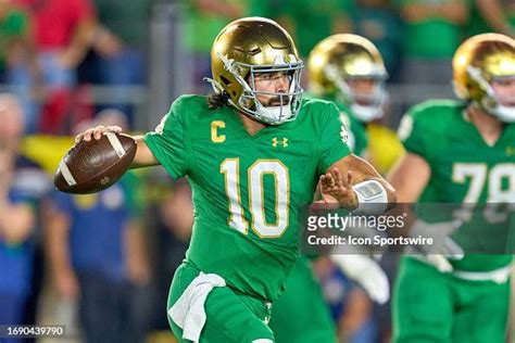 Notre Dame Fighting Irish Quarterback Sam Hartman Throws The Football