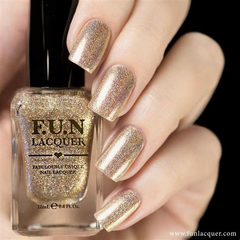 Its Time To Celebrate With This Gold Shimmery Glitter Nail Polish