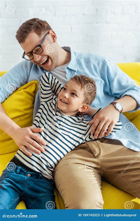 Happy Father And Son Laughing While Stock Image Image Of Laugh