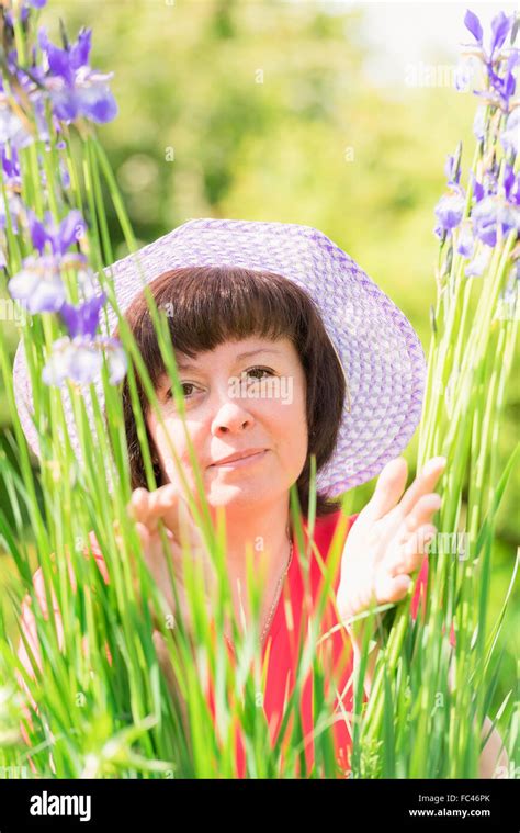 A Middle Aged Brunette White Hat Stock Photo Alamy