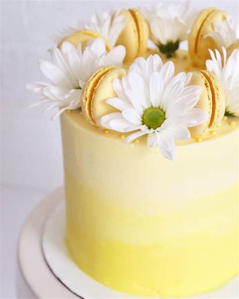 Yellow Ombr Cake With Flowers And Macaroons Yellow Birthday Cakes