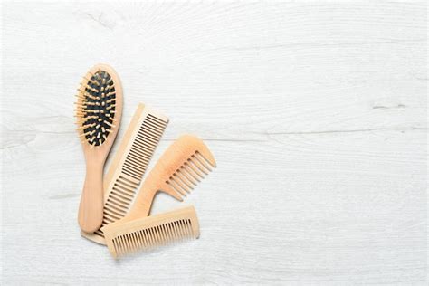 Premium Photo Wooden Hair Brushes Hair Care Makeup