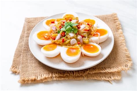 Premium Photo | Soft boiled eggs spicy salad