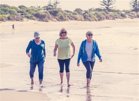 Beach Mature Woman Group Walking Stock Photos Free Royalty Free
