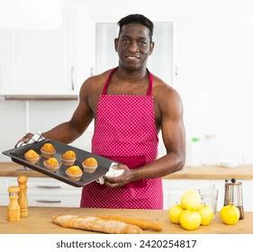 Cheerful Naked Man Red Apron Holding Stock Photo 2420254817 Shutterstock