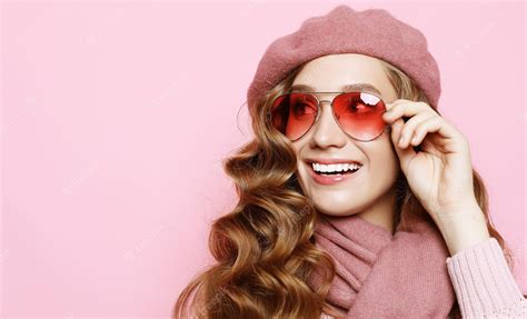 Premium Photo Beautiful Young Female Model With Long Wavy Hair Wearing Pink Beret And Scarf