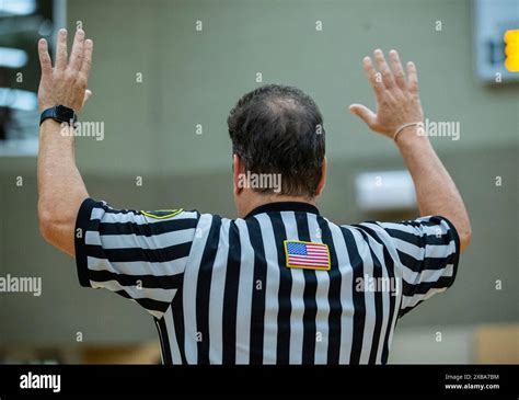 A Basketball Referee Using Hand Signals Stock Photo Alamy