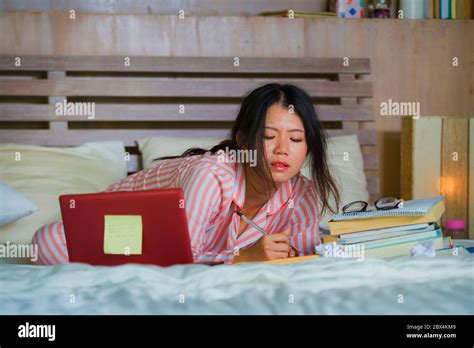 Young Frustrated And Tired Asian Chinese University Student Girl