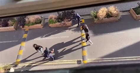 Moment Men Brawl With Machetes And Bats In Street Fight As Armed