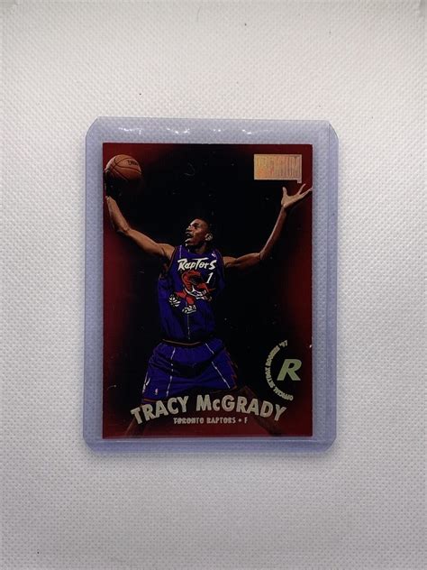 1997 98 SkyBox Premium Basketball ROOKIE CARD 79 Tracy McGrady Raptors