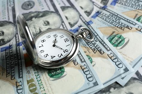 Premium Photo Time Is Money Concept With Pocket Watch And Dollars