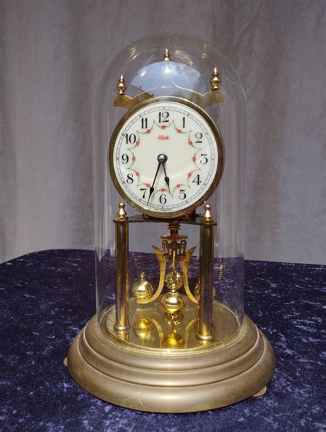 Kundo Annual Pendulum Clock Brass Glass Catawiki