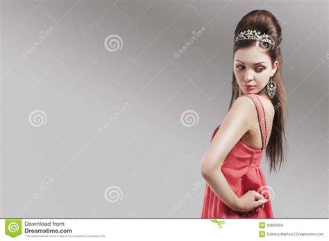 Sensual Caucasian Female In Evening Pink Dress Wearing Tiara Stock