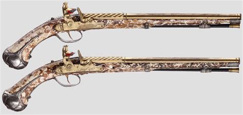 Magnificent Pair Of Ornate Ivory Stocked Flintlock Pistols By Christoph