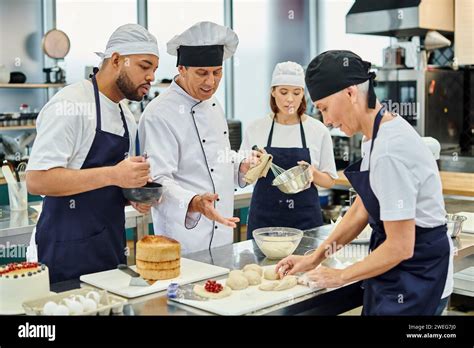 Jolly Mature Chief Cook With His Multicultural Chefs Watching Mature