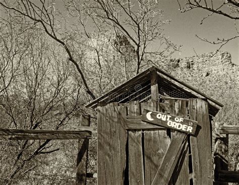 Falling Down Outhouse In The Old West With Out Of Order Sign Stock