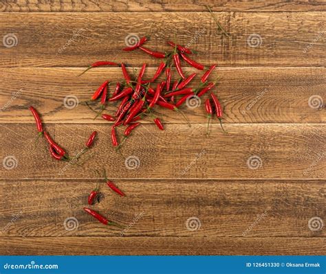 Very Hot Chili Peppers On Rustic Wooden Background Top View Stock Photo Image Of Pattern