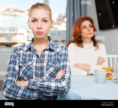 Mature Mother Soothes Adult Daughter Stock Photo Alamy