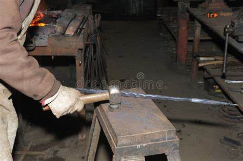 Hammering Glowing Steel To Strike While The Iron Is Hot Stock Photo Image Of Antique Craft