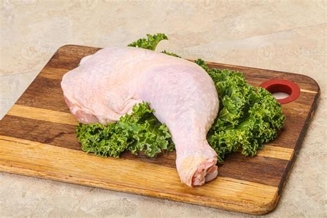 Raw chicken leg for cooking 8474116 Stock Photo at Vecteezy